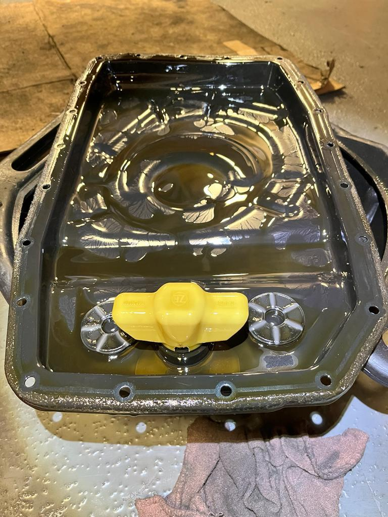 Transmission fluid pan removed from BMW X5