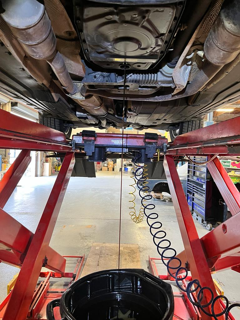 Old and new transmission fluid kit for BMW X5
