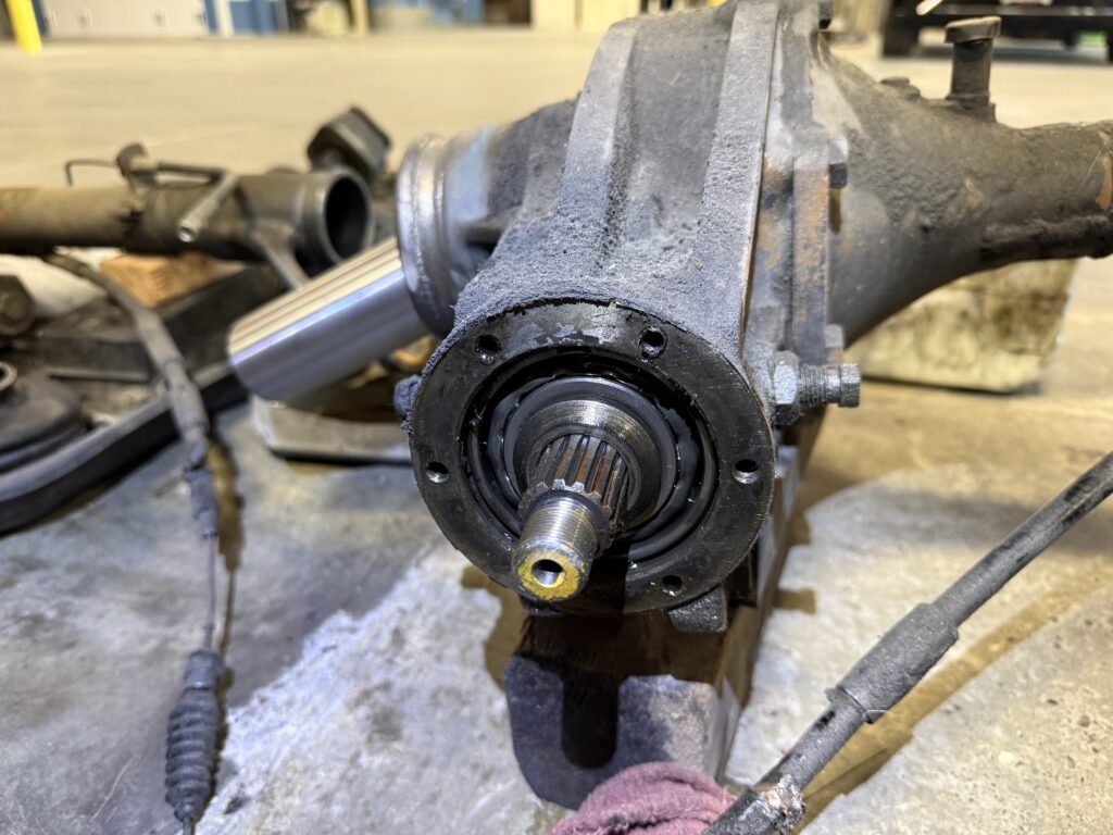 Mercedes SL190 rear differential internal bearing and axle spline close-up during repair