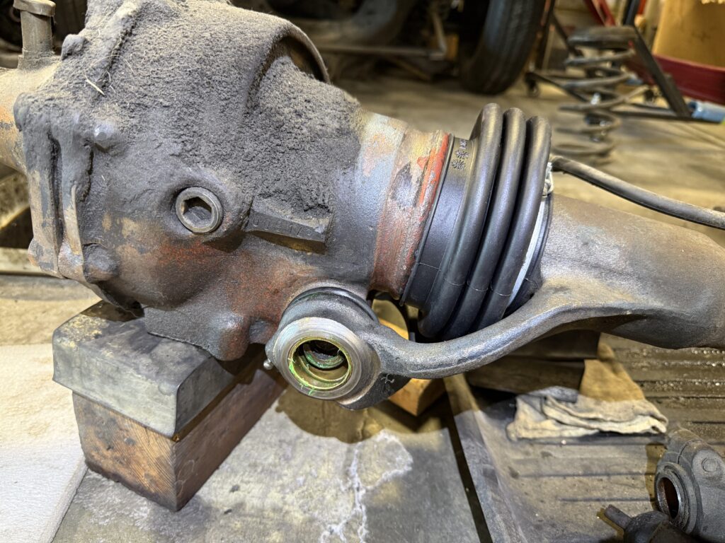 Mercedes SL190 rear differential with new CV boot installed during axle and suspension repair