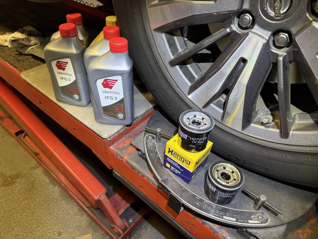 oil filter replacement during oil change service in Bay Area with Hengst filter and Idemitsu 0W-20 engine oil